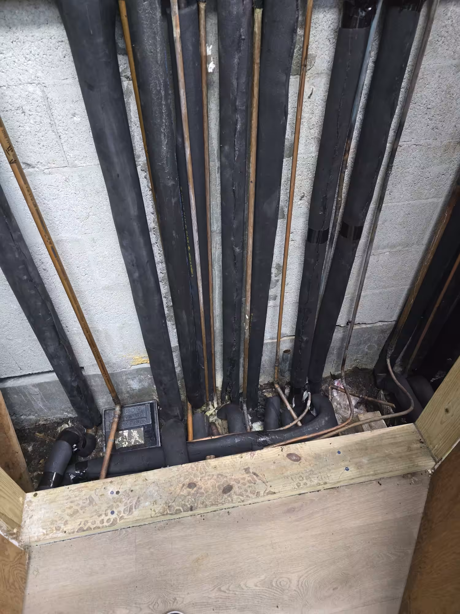 Precision seam sealing on commercial HVAC chilled water pipe insulation in South Florida