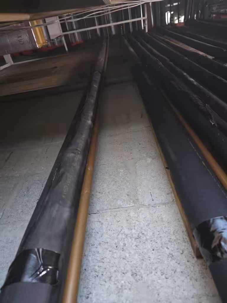 Elastomeric pipe insulation replacing degraded AC foam in a South Florida attic